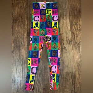 VERSACE HIGH WAIST LEGGINGS WITH ALPHABET PRINT. Size 38 Italy.